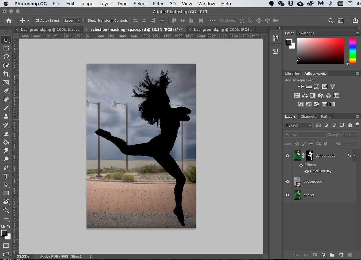 Photoshop workspace showing a masked dancer